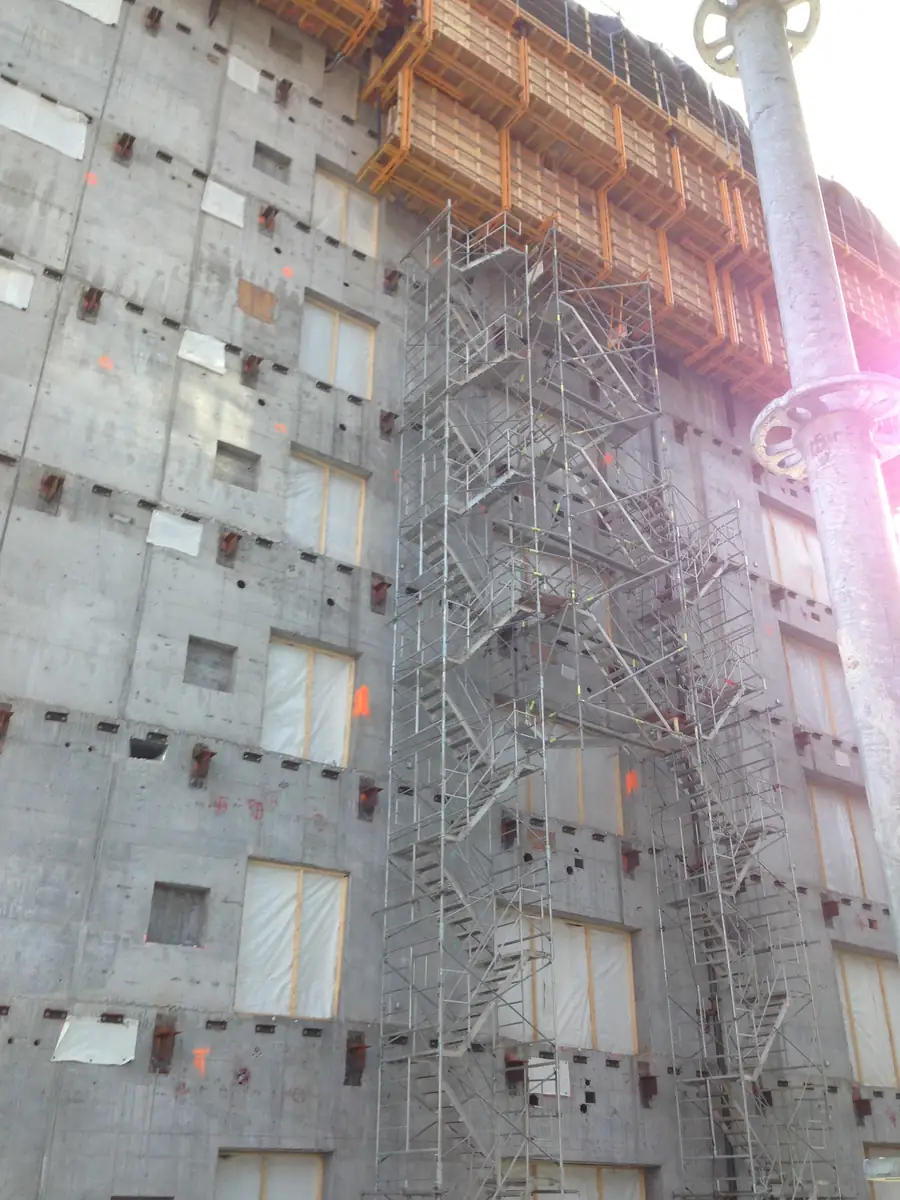 Frame scaffold stair tower on a concrete building