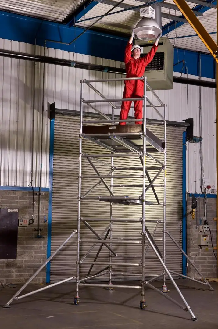 Rolling scaffold tower indoors